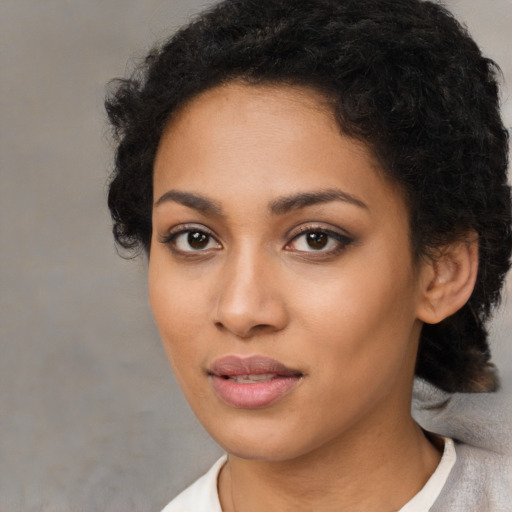 Neutral latino young-adult female with short  black hair and brown eyes