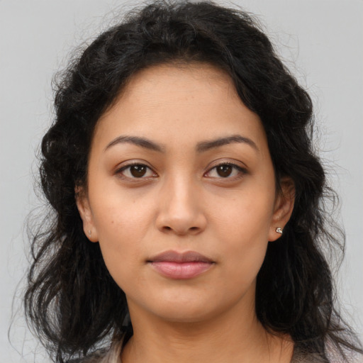 Neutral latino young-adult female with medium  brown hair and brown eyes