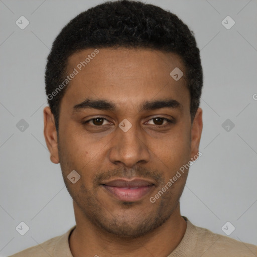 Joyful black young-adult male with short  brown hair and brown eyes