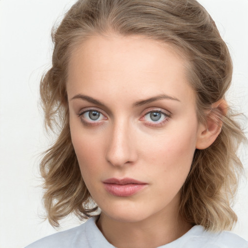 Neutral white young-adult female with medium  brown hair and blue eyes