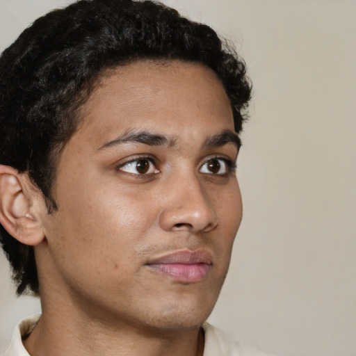 Neutral black young-adult male with short  brown hair and brown eyes