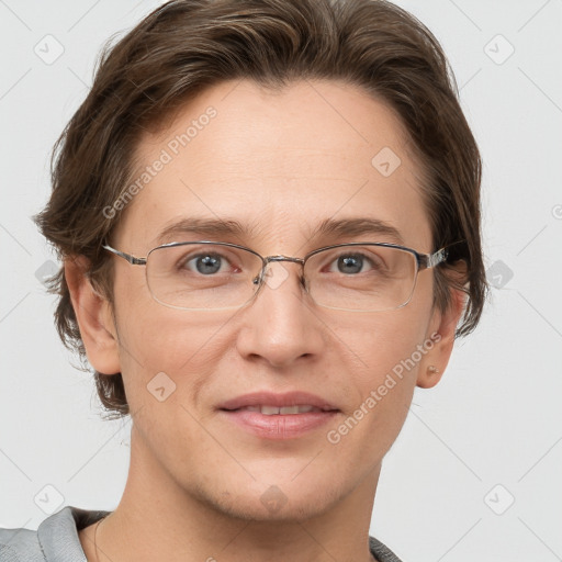 Joyful white adult female with short  brown hair and grey eyes