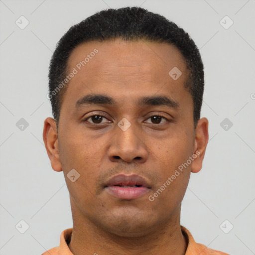 Neutral latino young-adult male with short  brown hair and brown eyes
