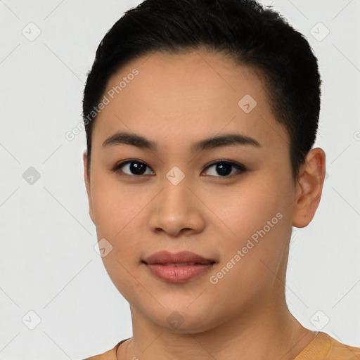 Joyful latino young-adult female with short  black hair and brown eyes