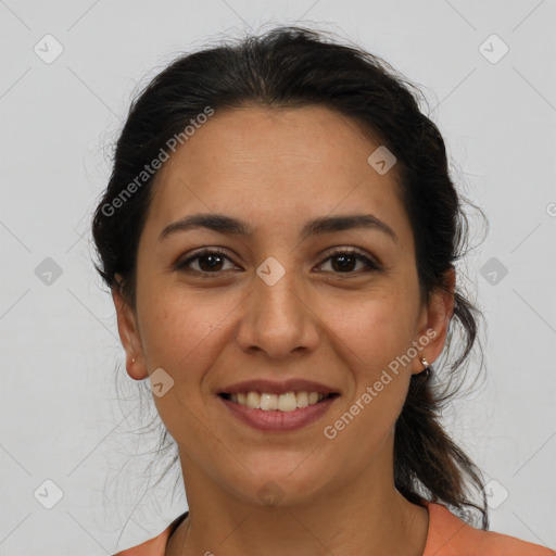 Joyful latino young-adult female with medium  brown hair and brown eyes