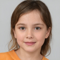 Joyful white child female with medium  brown hair and brown eyes