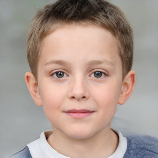 Joyful white child male with short  brown hair and brown eyes