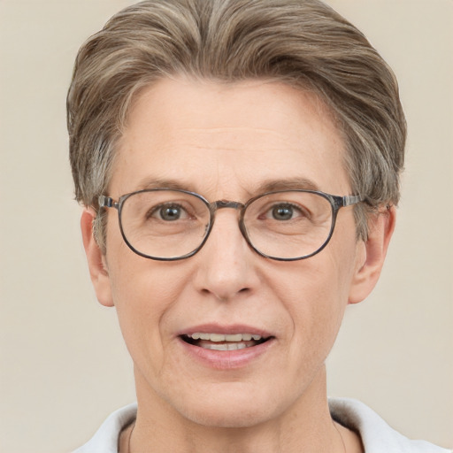 Joyful white adult male with short  brown hair and grey eyes