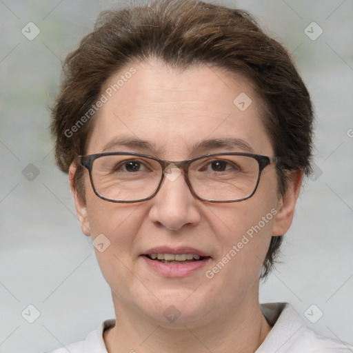 Joyful white adult female with short  brown hair and brown eyes