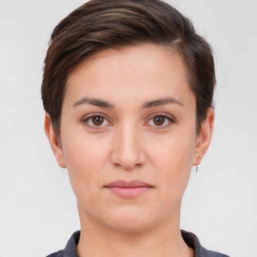 Neutral white young-adult female with short  brown hair and brown eyes