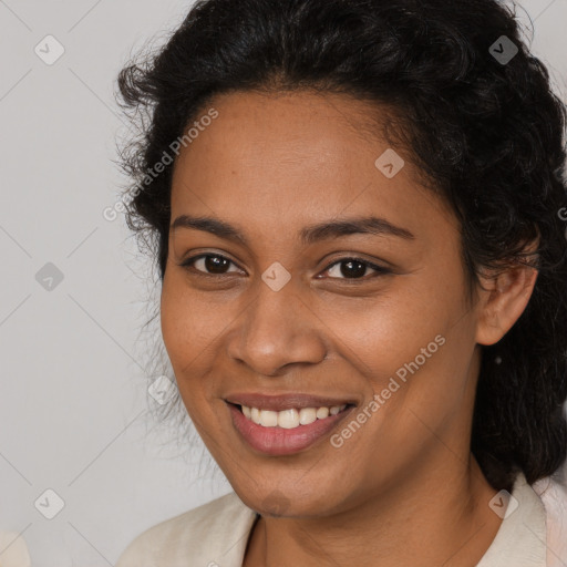 Joyful latino young-adult female with long  brown hair and brown eyes