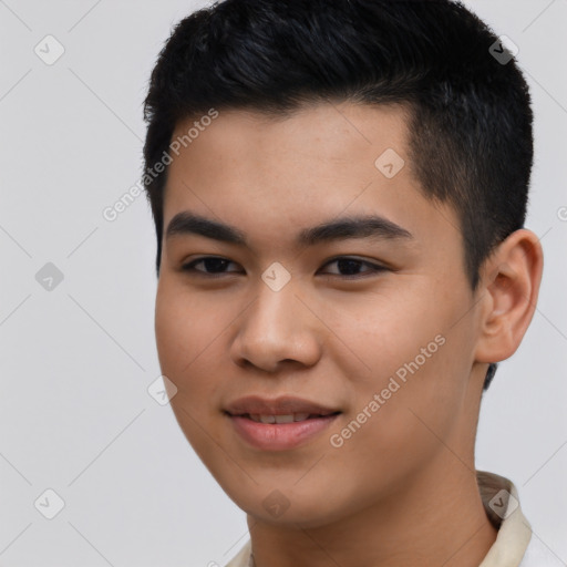 Joyful asian young-adult male with short  black hair and brown eyes