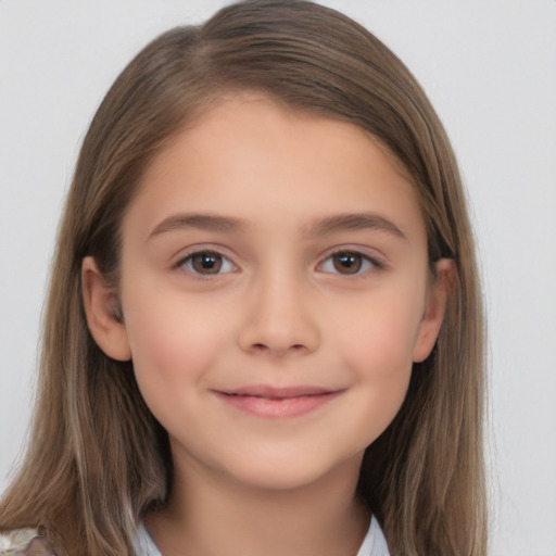 Joyful white child female with long  brown hair and brown eyes