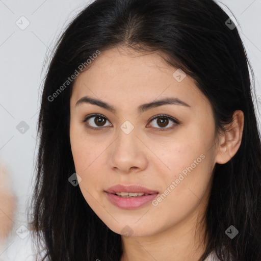 Joyful asian young-adult female with long  brown hair and brown eyes