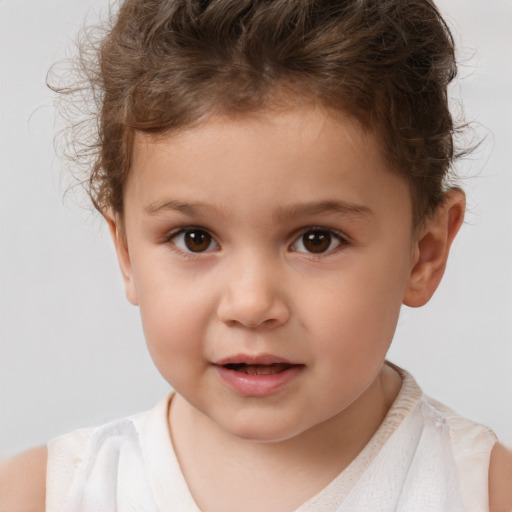 Joyful white child male with short  brown hair and brown eyes