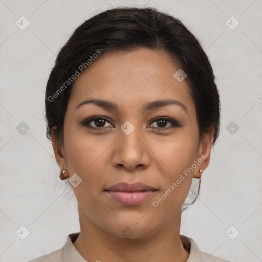 Joyful latino young-adult female with short  brown hair and brown eyes