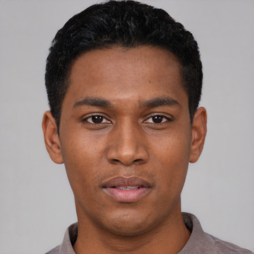Neutral black young-adult male with short  black hair and brown eyes