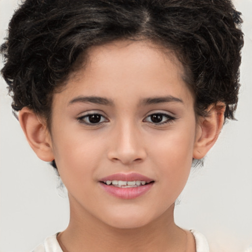 Joyful white child female with short  brown hair and brown eyes