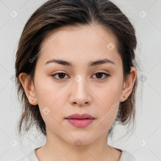 Neutral white young-adult female with medium  brown hair and brown eyes