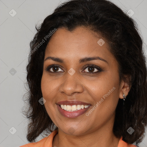 Joyful black young-adult female with medium  brown hair and brown eyes