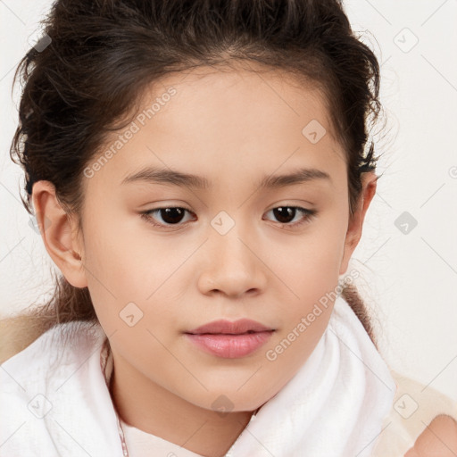 Joyful white child female with short  brown hair and brown eyes