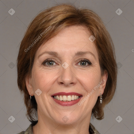 Joyful white adult female with medium  brown hair and grey eyes