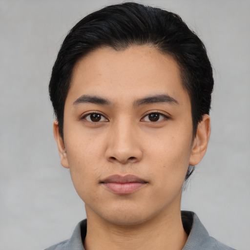 Neutral asian young-adult male with short  black hair and brown eyes