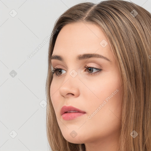 Neutral white young-adult female with long  brown hair and brown eyes