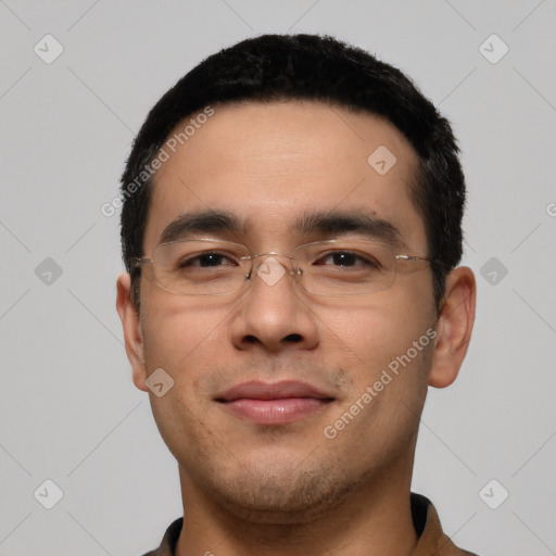 Joyful white young-adult male with short  black hair and brown eyes