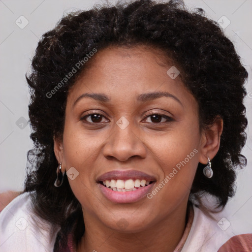 Joyful black young-adult female with medium  brown hair and brown eyes