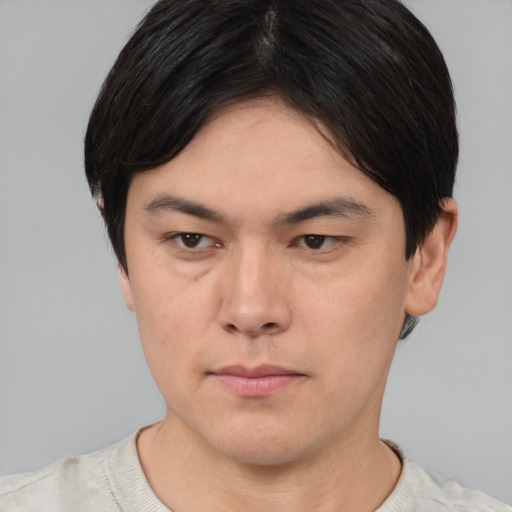 Neutral asian young-adult male with short  brown hair and brown eyes