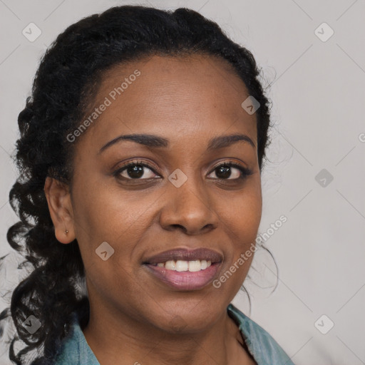 Joyful black young-adult female with long  brown hair and brown eyes