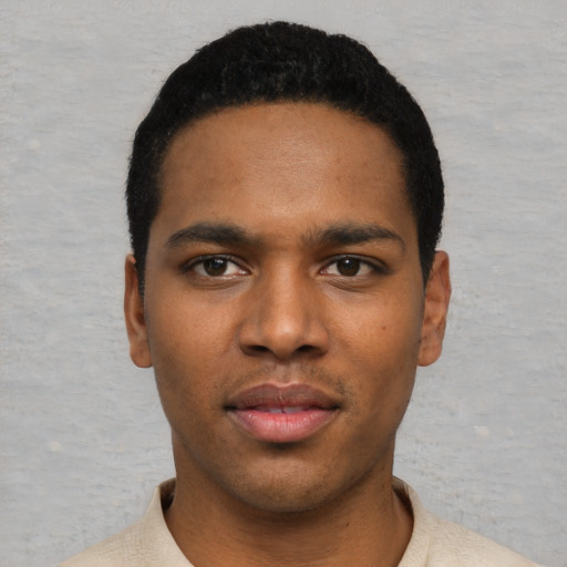 Neutral black young-adult male with short  black hair and brown eyes