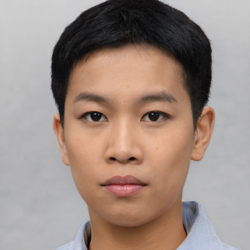 Neutral asian young-adult male with short  black hair and brown eyes