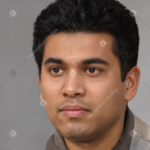 Neutral latino young-adult male with short  black hair and brown eyes
