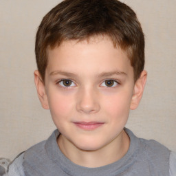 Joyful white child male with short  brown hair and brown eyes