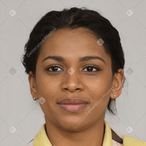 Joyful black young-adult female with short  brown hair and brown eyes