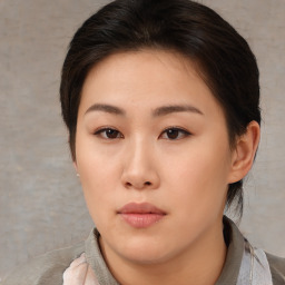 Neutral asian young-adult female with medium  brown hair and brown eyes