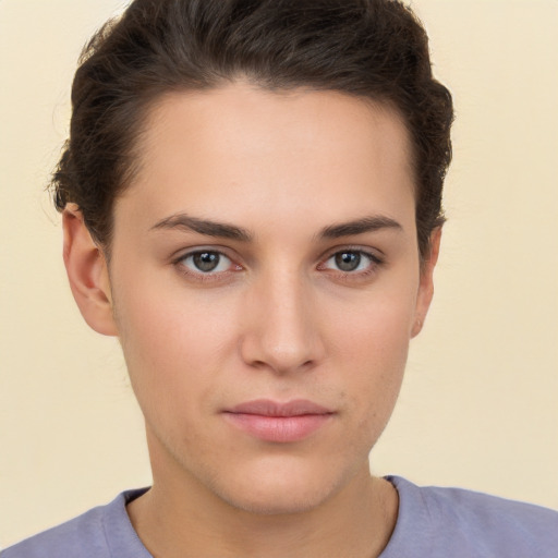 Neutral white young-adult female with short  brown hair and brown eyes