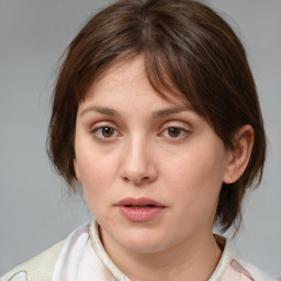 Neutral white young-adult female with medium  brown hair and brown eyes