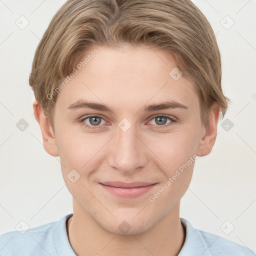 Joyful white young-adult female with short  brown hair and grey eyes