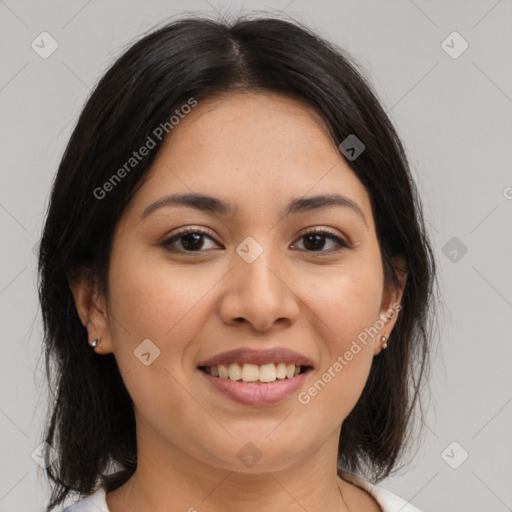 Joyful latino young-adult female with medium  brown hair and brown eyes