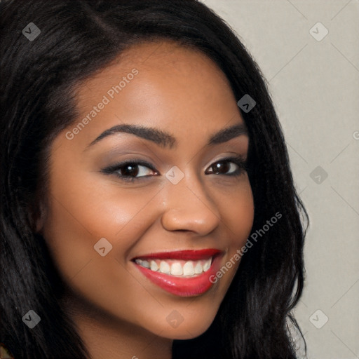 Joyful latino young-adult female with long  brown hair and brown eyes