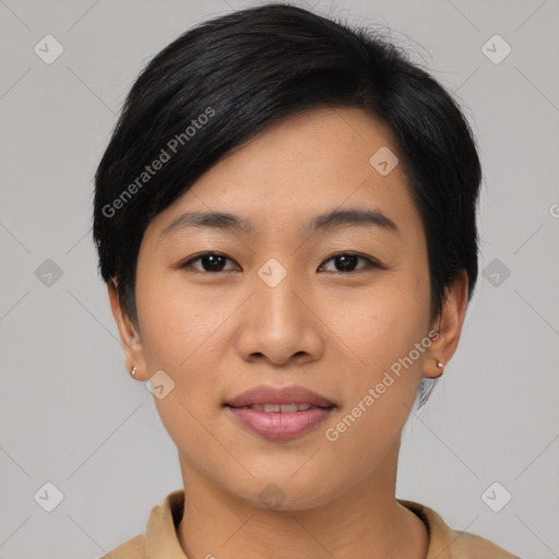 Joyful asian young-adult female with short  black hair and brown eyes