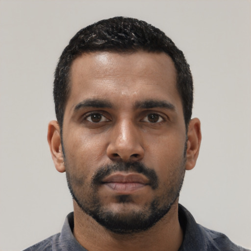 Neutral black young-adult male with short  black hair and brown eyes