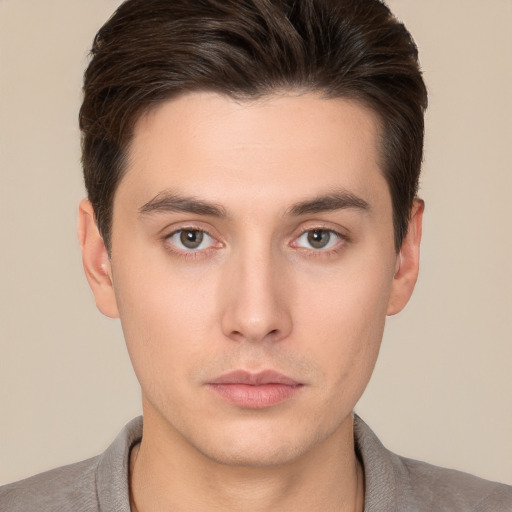 Neutral white young-adult male with short  brown hair and brown eyes