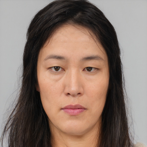 Neutral asian young-adult female with long  brown hair and brown eyes