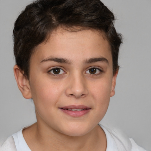 Joyful white child female with short  brown hair and brown eyes