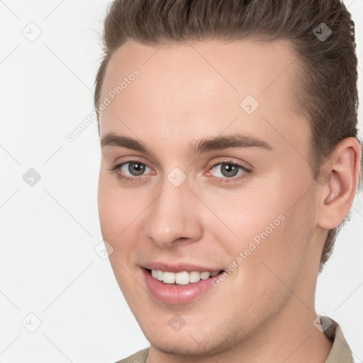 Joyful white young-adult female with short  brown hair and brown eyes