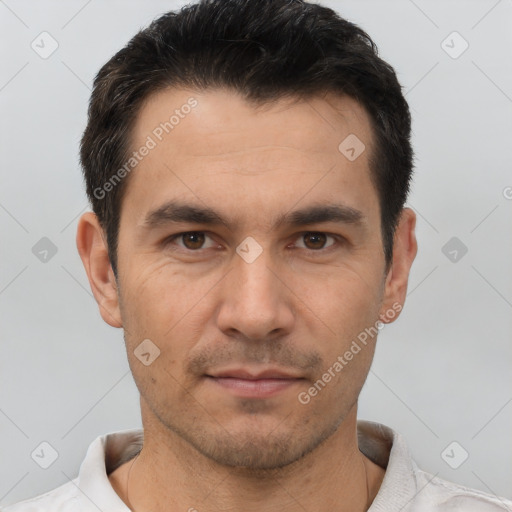 Joyful white young-adult male with short  brown hair and brown eyes